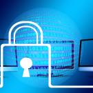 An illustration showing an outline of a white padlock superimposed over three computer monitors with a gradient blue background.